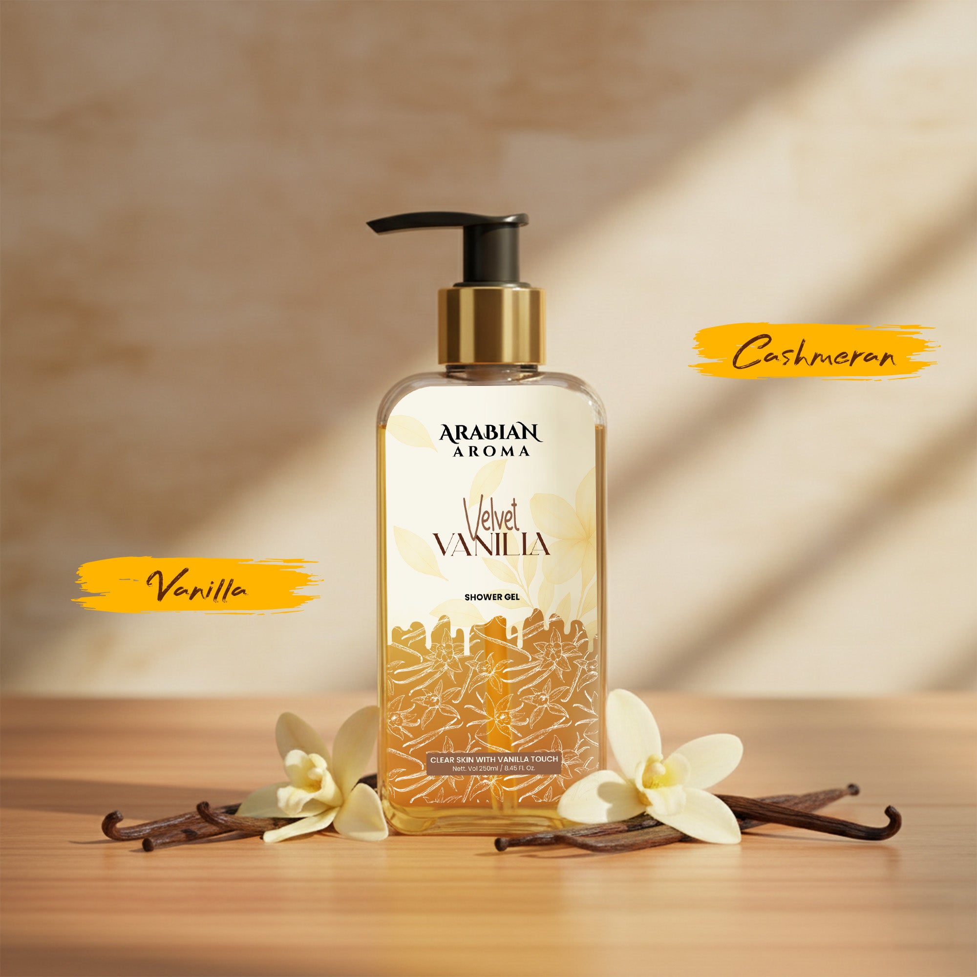 Shower gel bottle with vanilla flowers and vanilla beans on a wooden surface